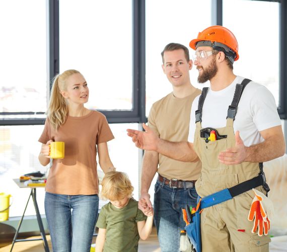 Family talking to builder